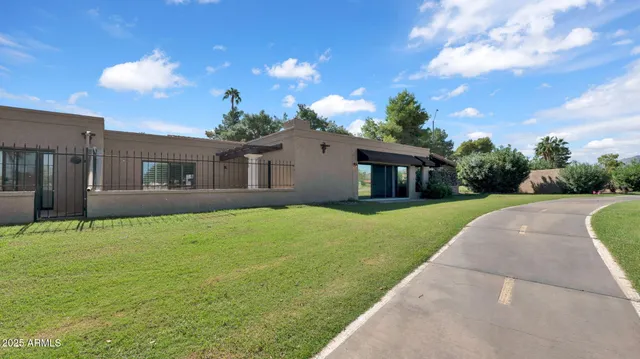 a view of a swimming pool and an outdoor space