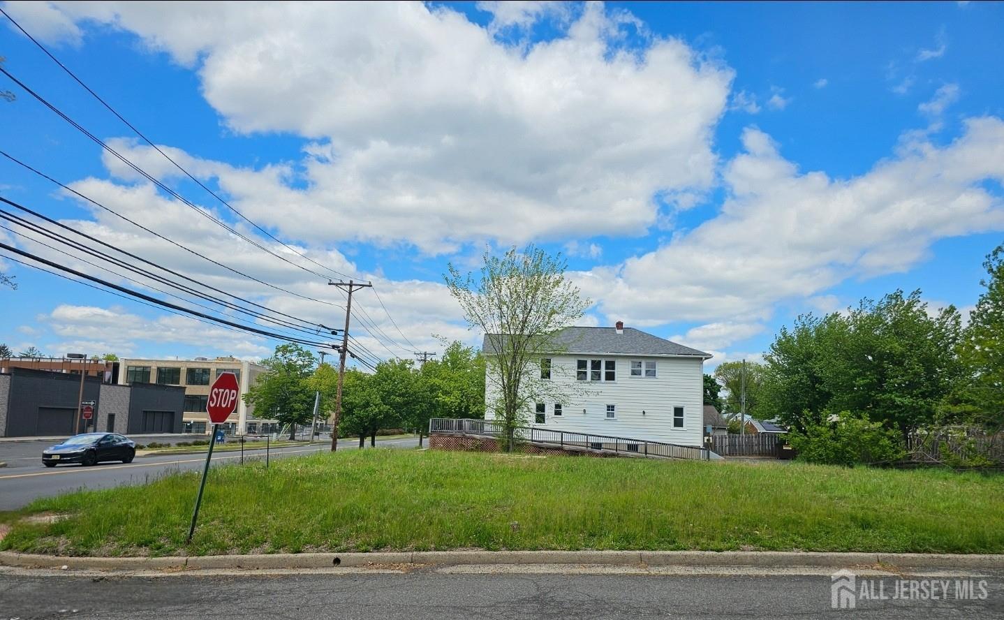115 Stelton Road Piscataway, NJ 08854 - Photo 1 of 4 a view of house with a entertaining space