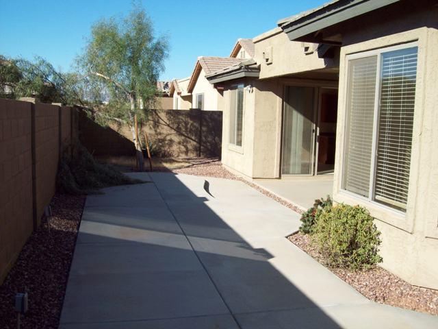 15331 West Calavar Road Surprise, AZ 85379 - Photo 14 of 15 a view of a house with a yard