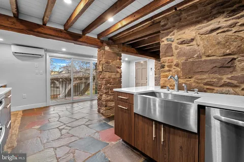 a view of a building with a yard