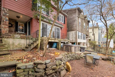 a spacious bedroom with a bed and walk in closet