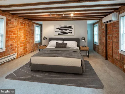 a view of front door with wooden floor