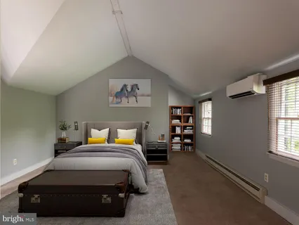 a front view of a house with sitting area