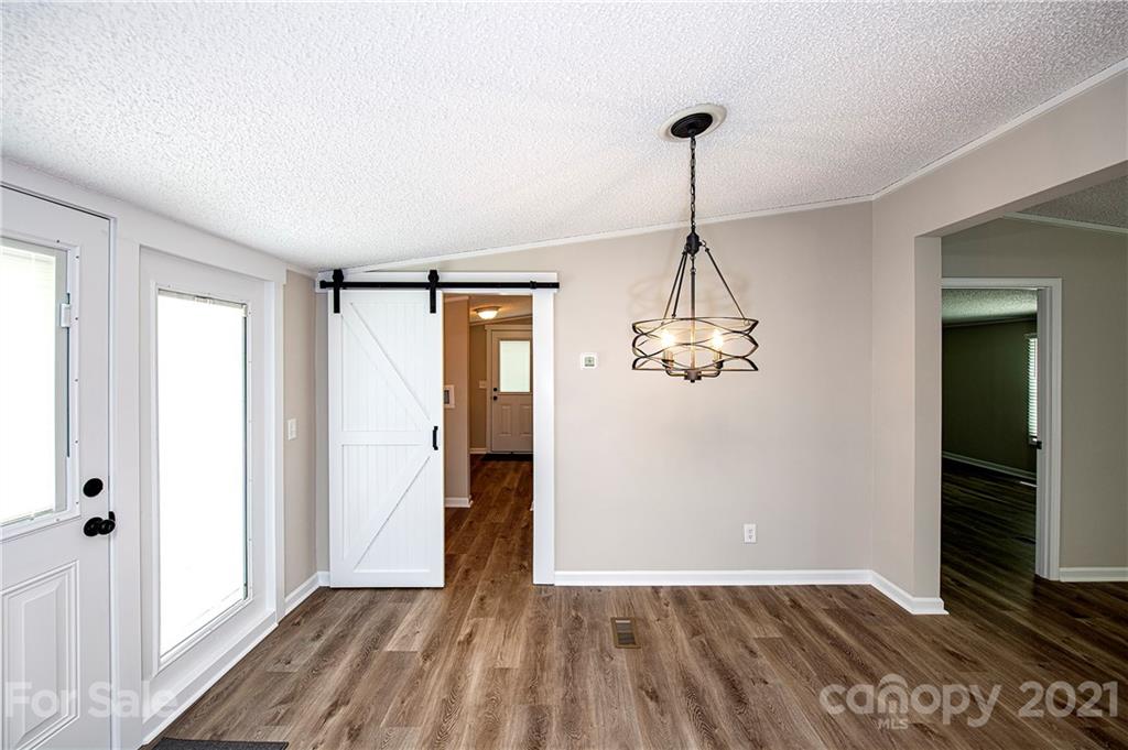 1844 Reservation Road Rock Hill, SC 29730 - Photo 14 of 28 wooden floor in an empty room with a window