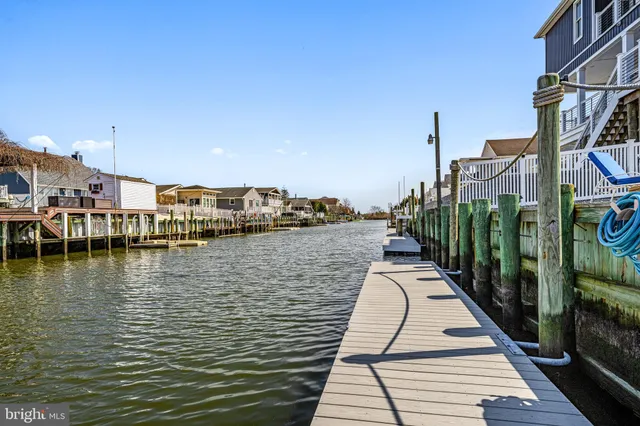 an aerial view of a house with a ocean view
