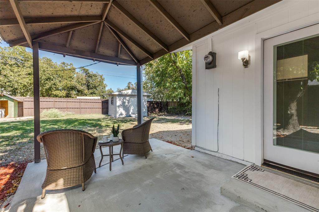 1705 Magnolia Drive Mesquite, TX 75149 - Photo 17 of 24 a patio with yard glass top table and chairs