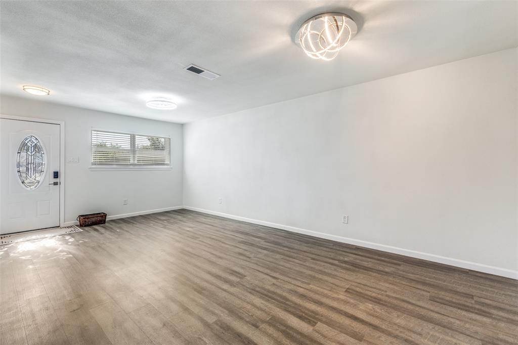 1705 Magnolia Drive Mesquite, TX 75149 - Photo 5 of 24 an empty room with windows