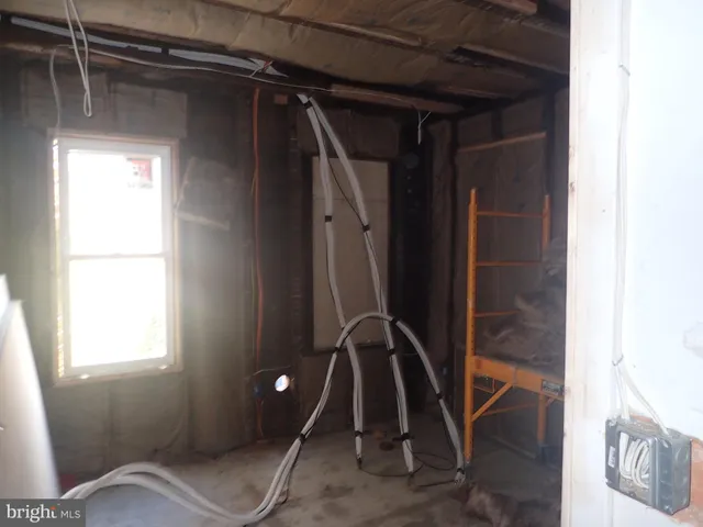 a view of a street with a building in the background