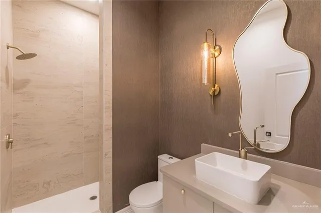 an empty room with a ceiling fan and a window