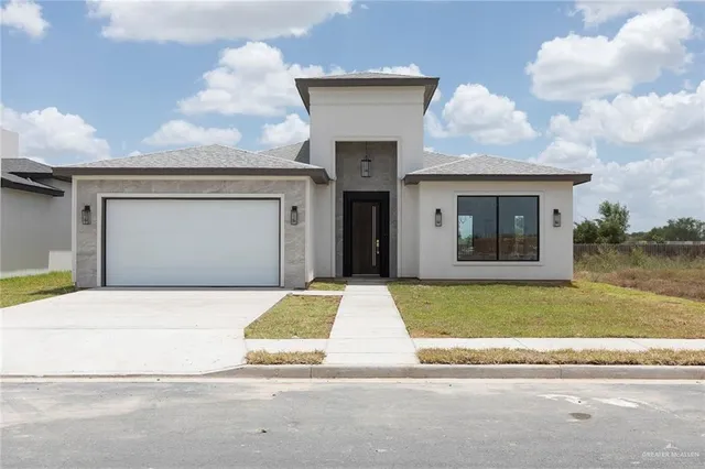 a bathroom with a window and mirror