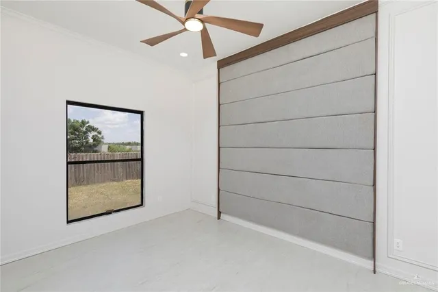 a bathroom with a granite countertop sink mirror and shower