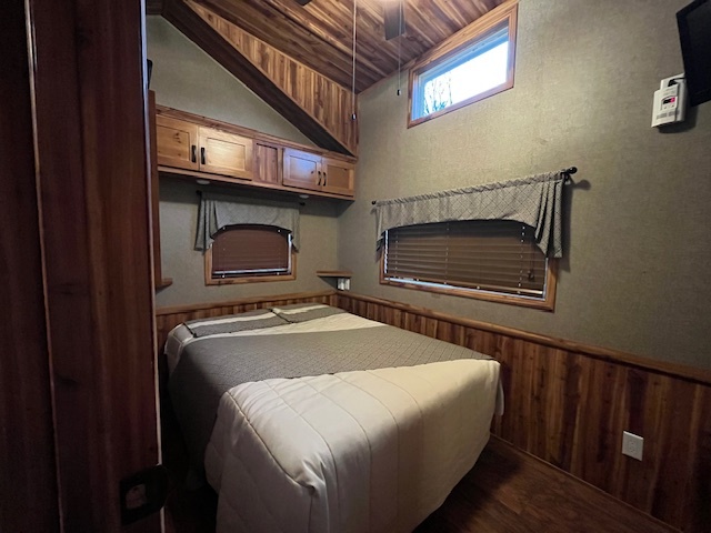 2795 East 28th Road Marseilles, IL 61341 - Photo 13 of 58 a bedroom with a bed and a fireplace