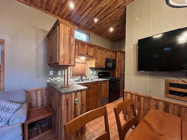 2795 East 28th Road Marseilles, IL 61341 - Photo 6 of 58 a kitchen with stainless steel appliances a microwave a sink and cabinets