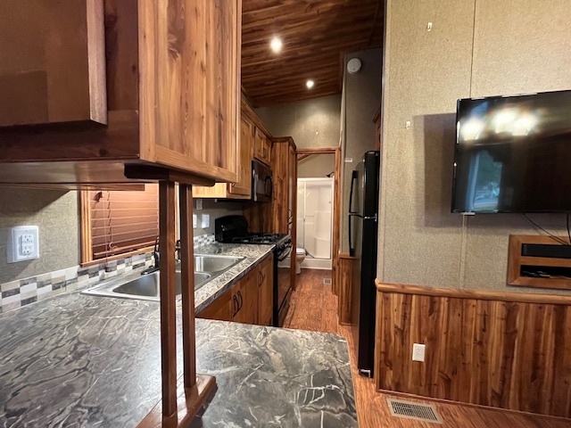 2795 East 28th Road Marseilles, IL 61341 - Photo 7 of 58 a view of a kitchen with a sink and cabinets