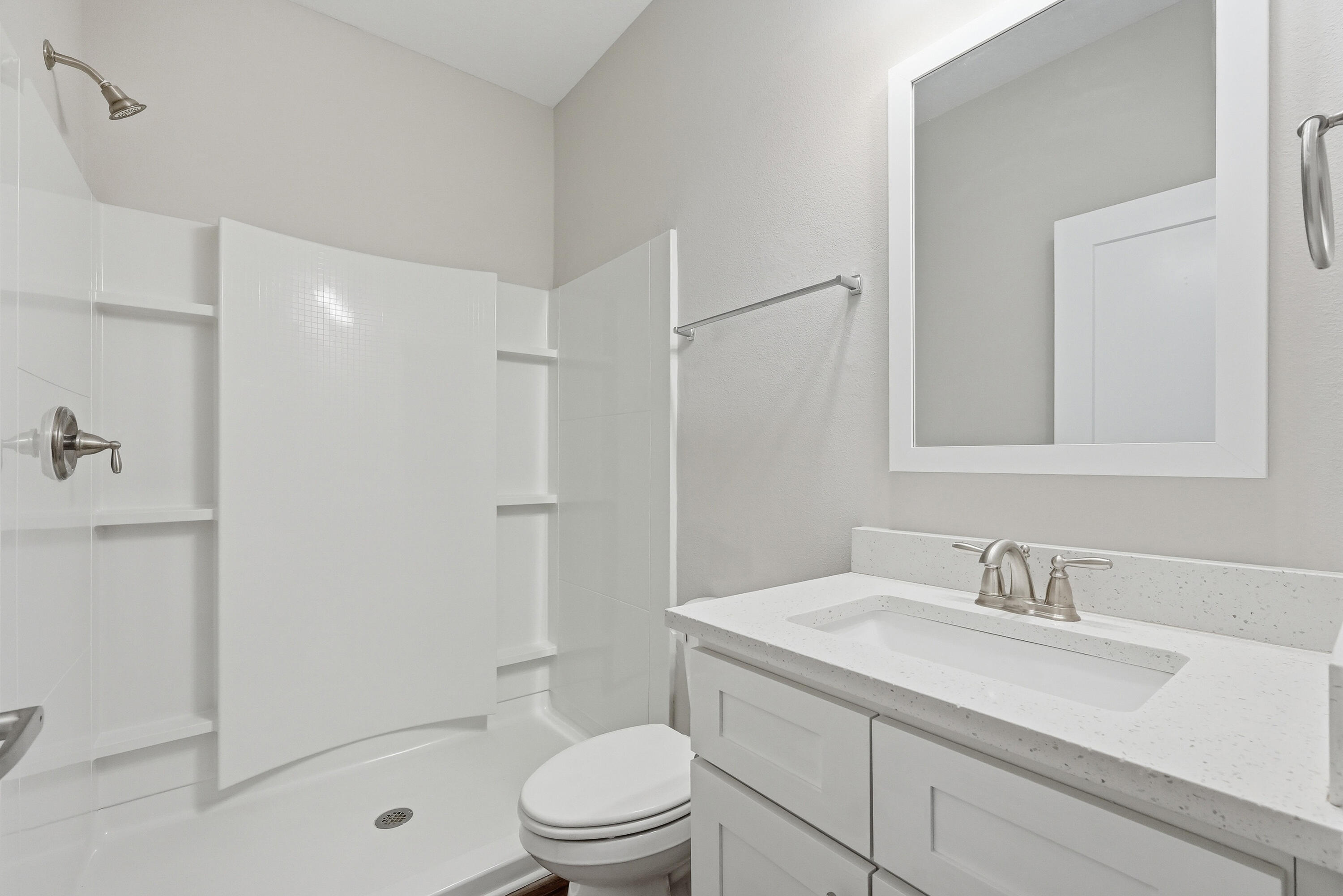 246 North Sand Palm Road Freeport, FL 32439 - Photo 20 of 42 a bathroom with a sink toilet vanity and shower