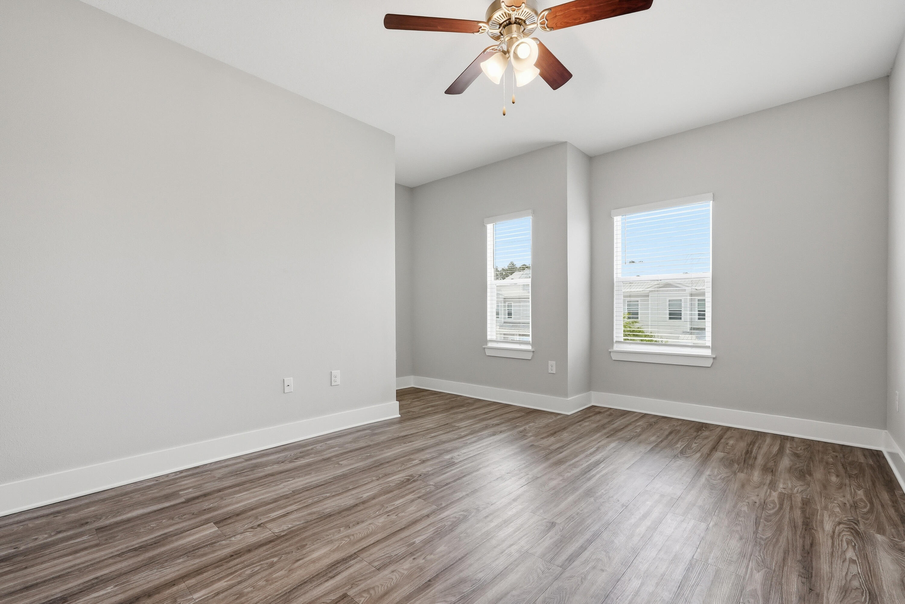 246 North Sand Palm Road Freeport, FL 32439 - Photo 25 of 42 a view of an empty room with wooden floor and a window