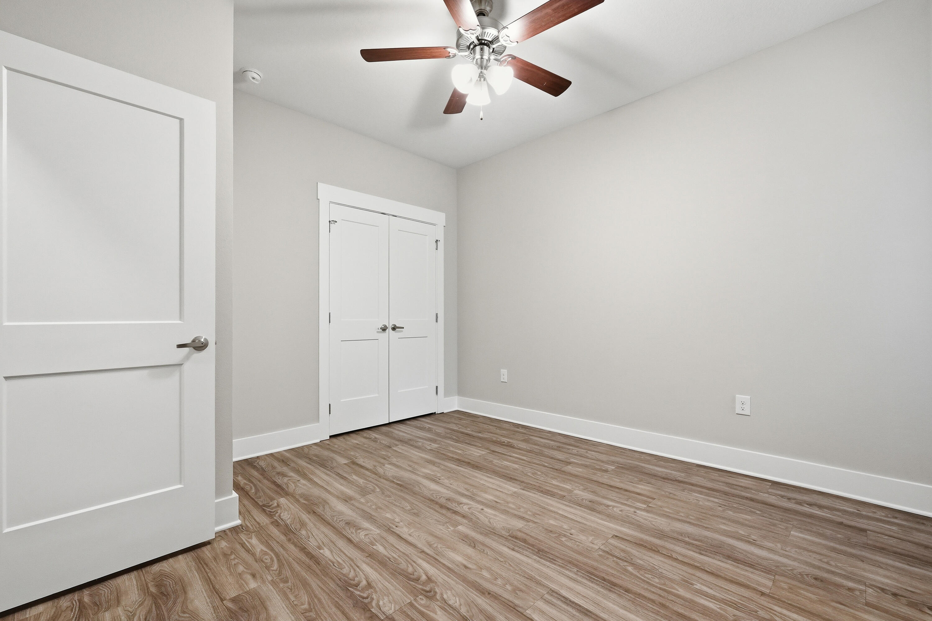 246 North Sand Palm Road Freeport, FL 32439 - Photo 28 of 42 wooden floor in an empty room