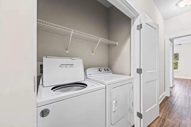 a utility room with dryer and washer