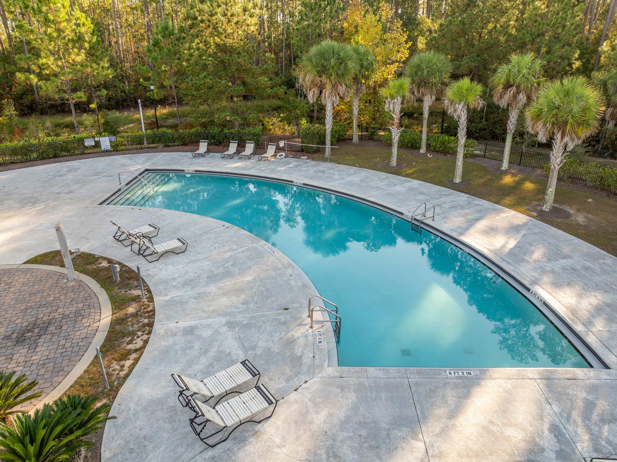 246 North Sand Palm Road Freeport, FL 32439 - Photo 35 of 36 a view of a swimming pool with a patio