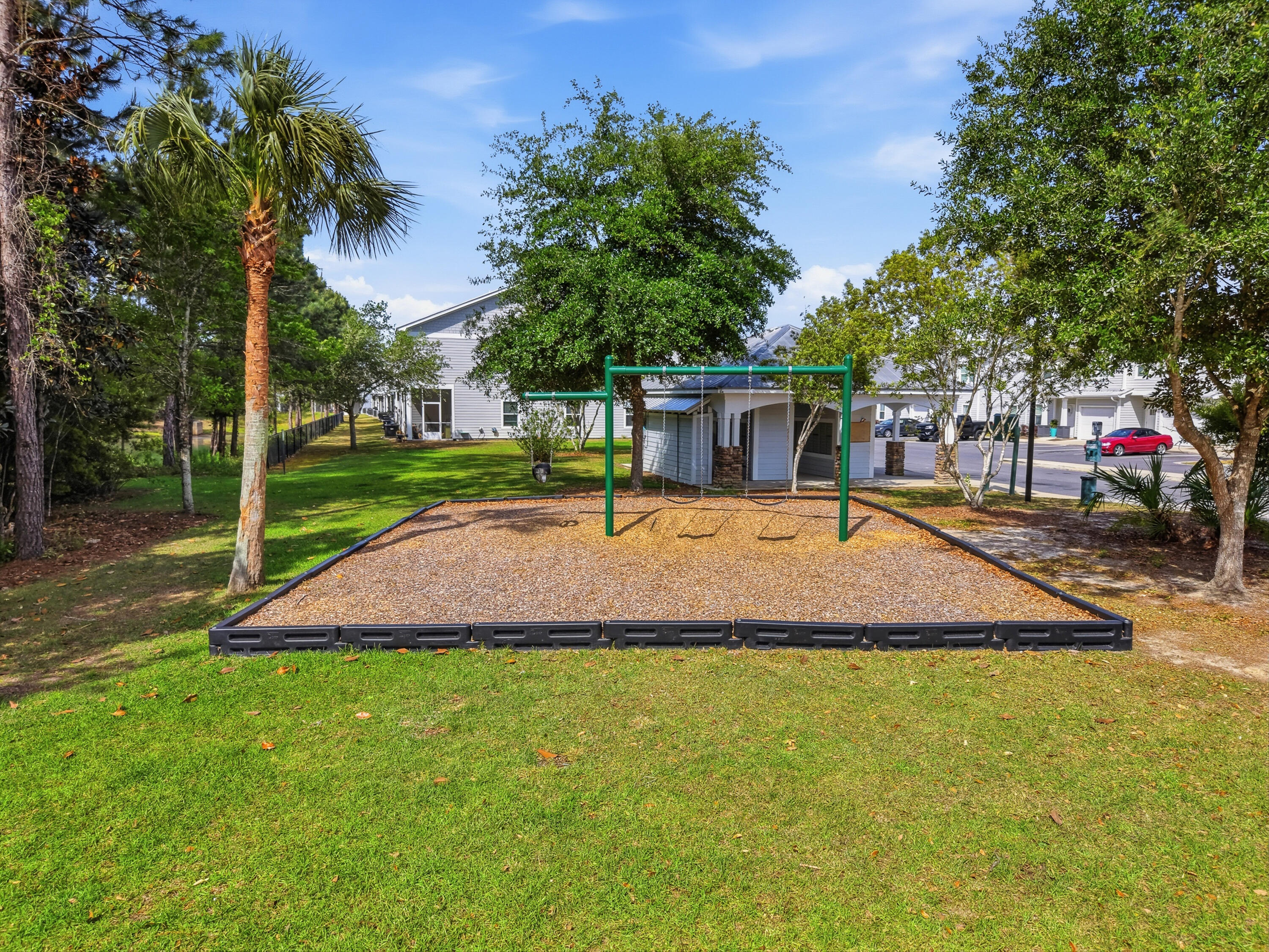 246 North Sand Palm Road Freeport, FL 32439 - Photo 39 of 42 a swimming pool with outdoor seating and yard