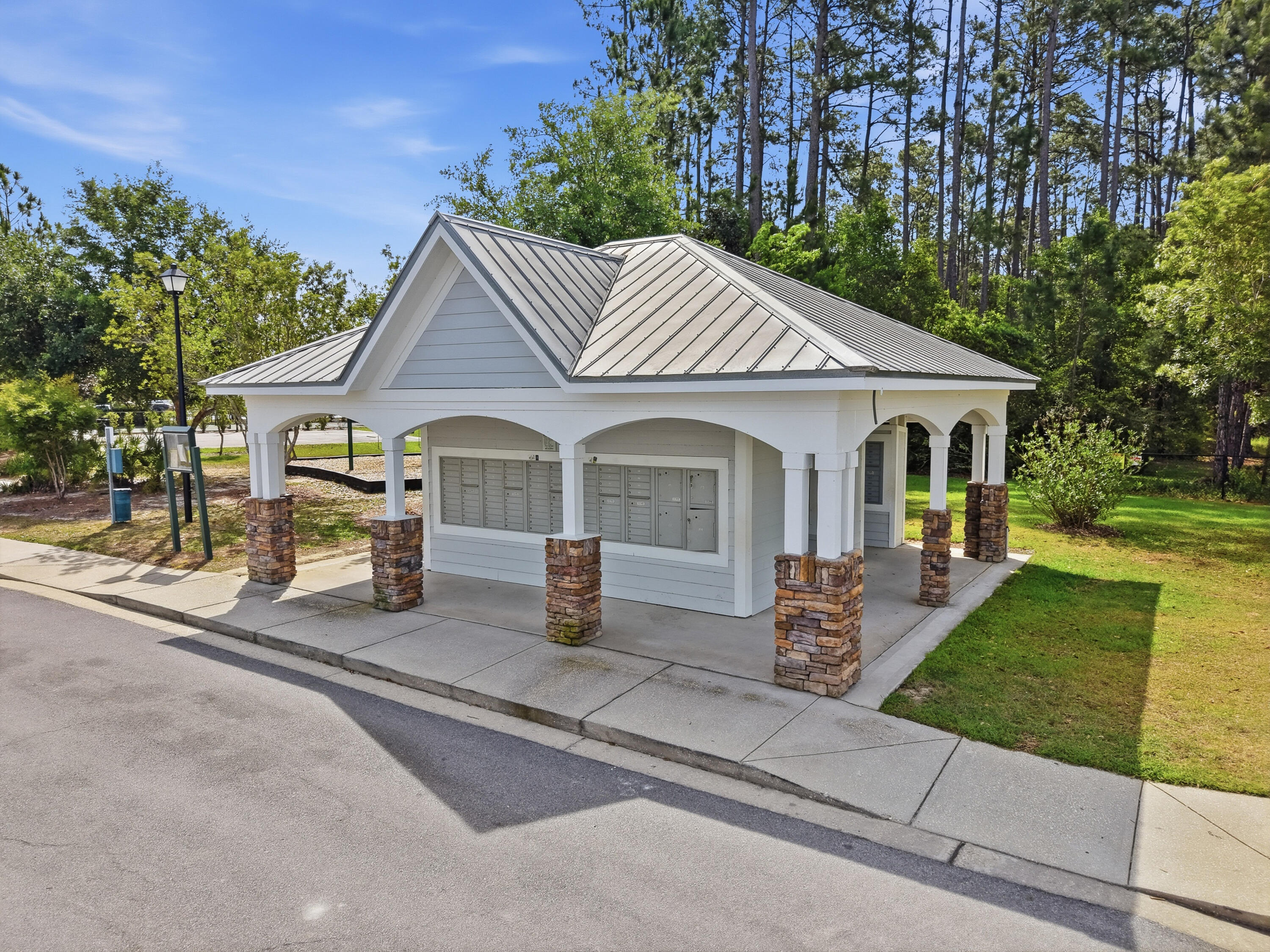 246 North Sand Palm Road Freeport, FL 32439 - Photo 41 of 42 a front view of a house with garden