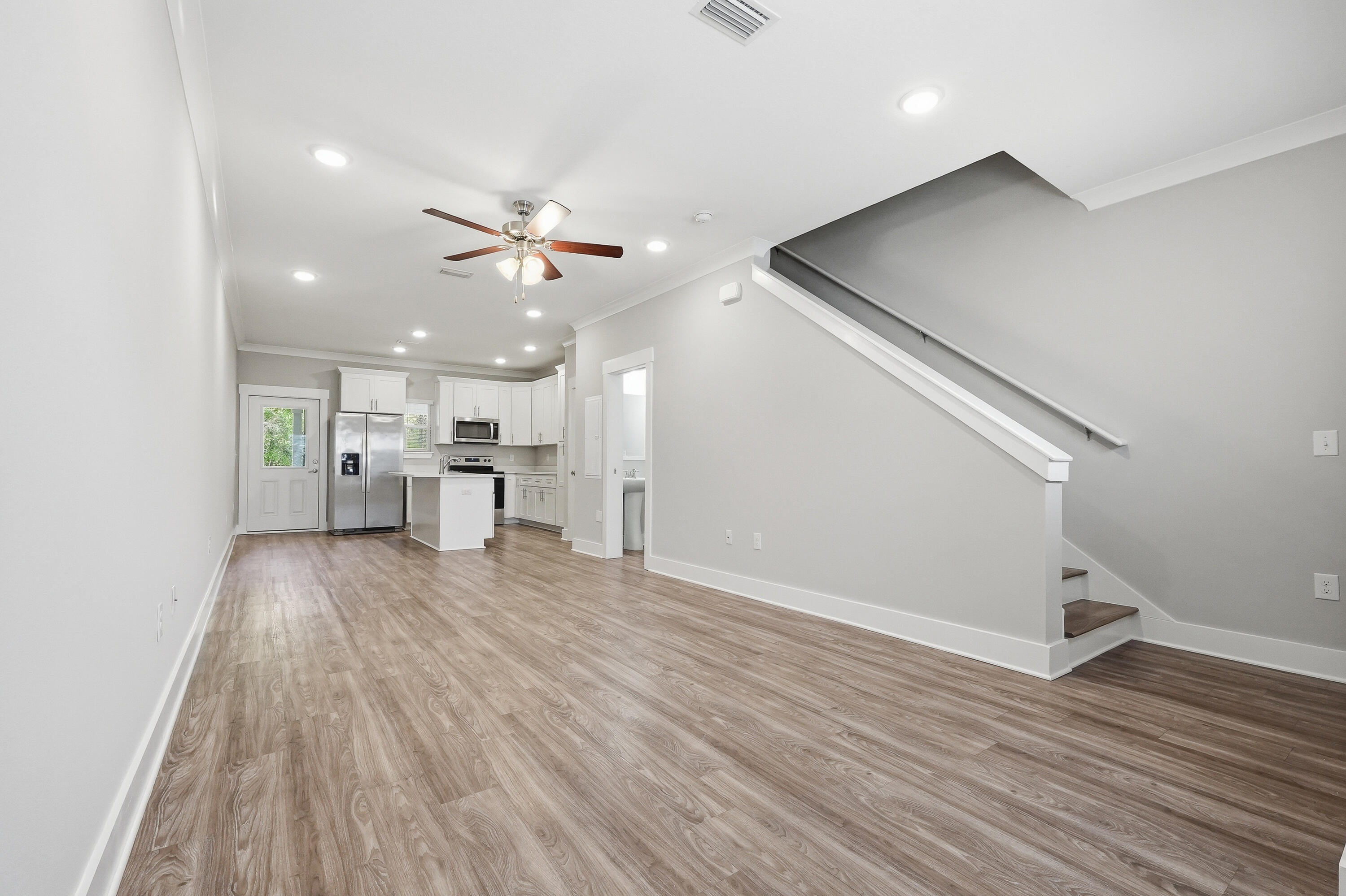 246 North Sand Palm Road Freeport, FL 32439 - Photo 6 of 42 a view of empty room with wooden floor