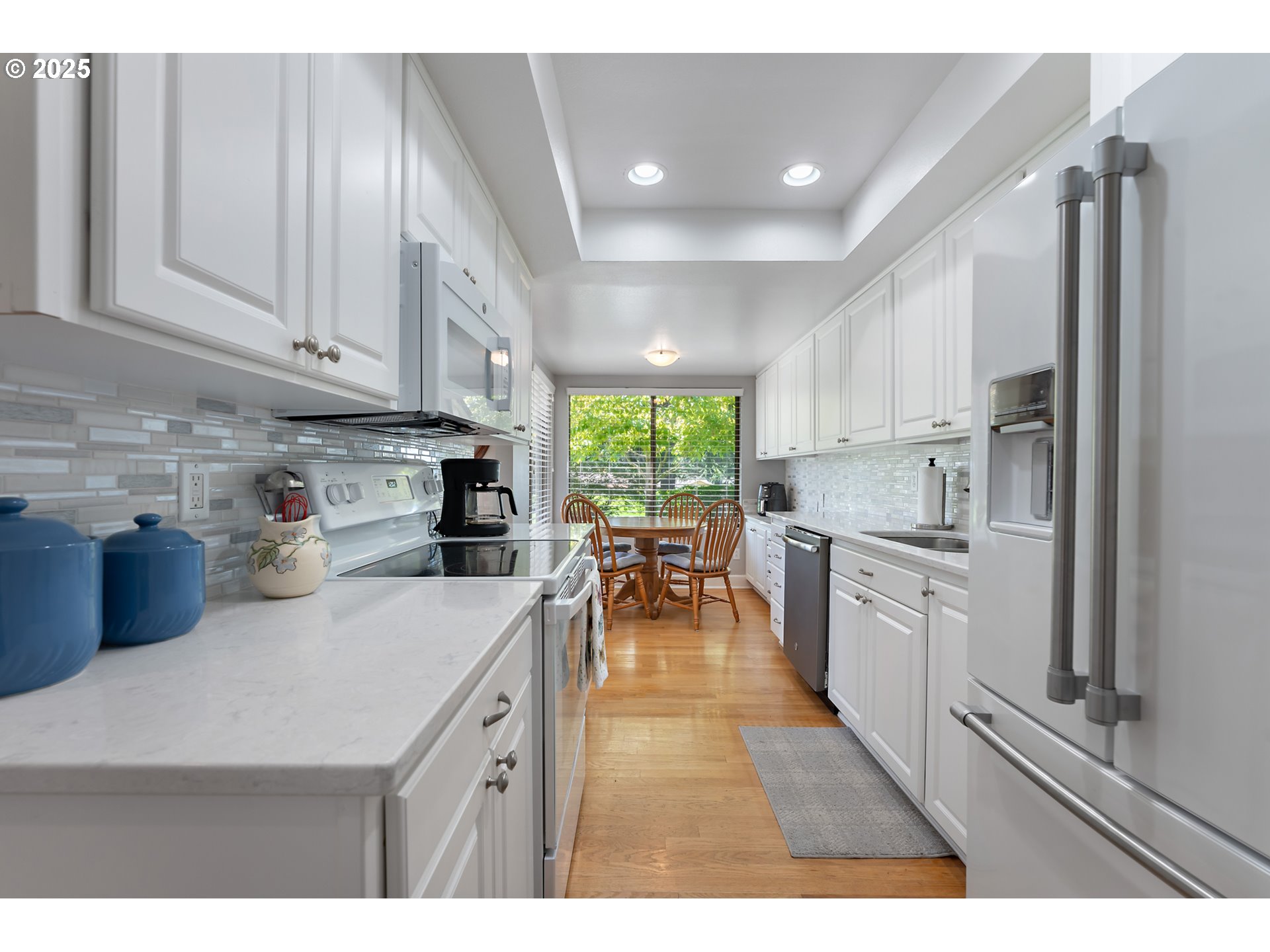 15730 Southwest Greens Way Portland, OR 97224 - Photo 13 of 42 a kitchen with lots of counter top space and refrigerator
