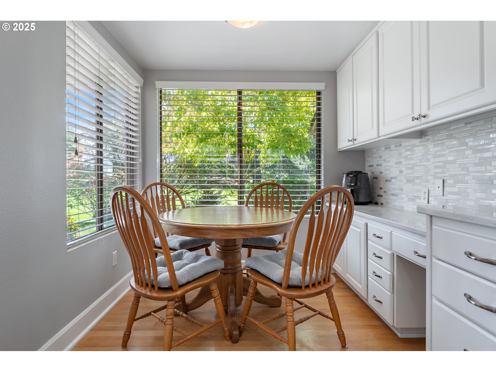 15730 Southwest Greens Way Portland, OR 97224 - Photo 18 of 42 a view of a dining room with furniture window and outside view
