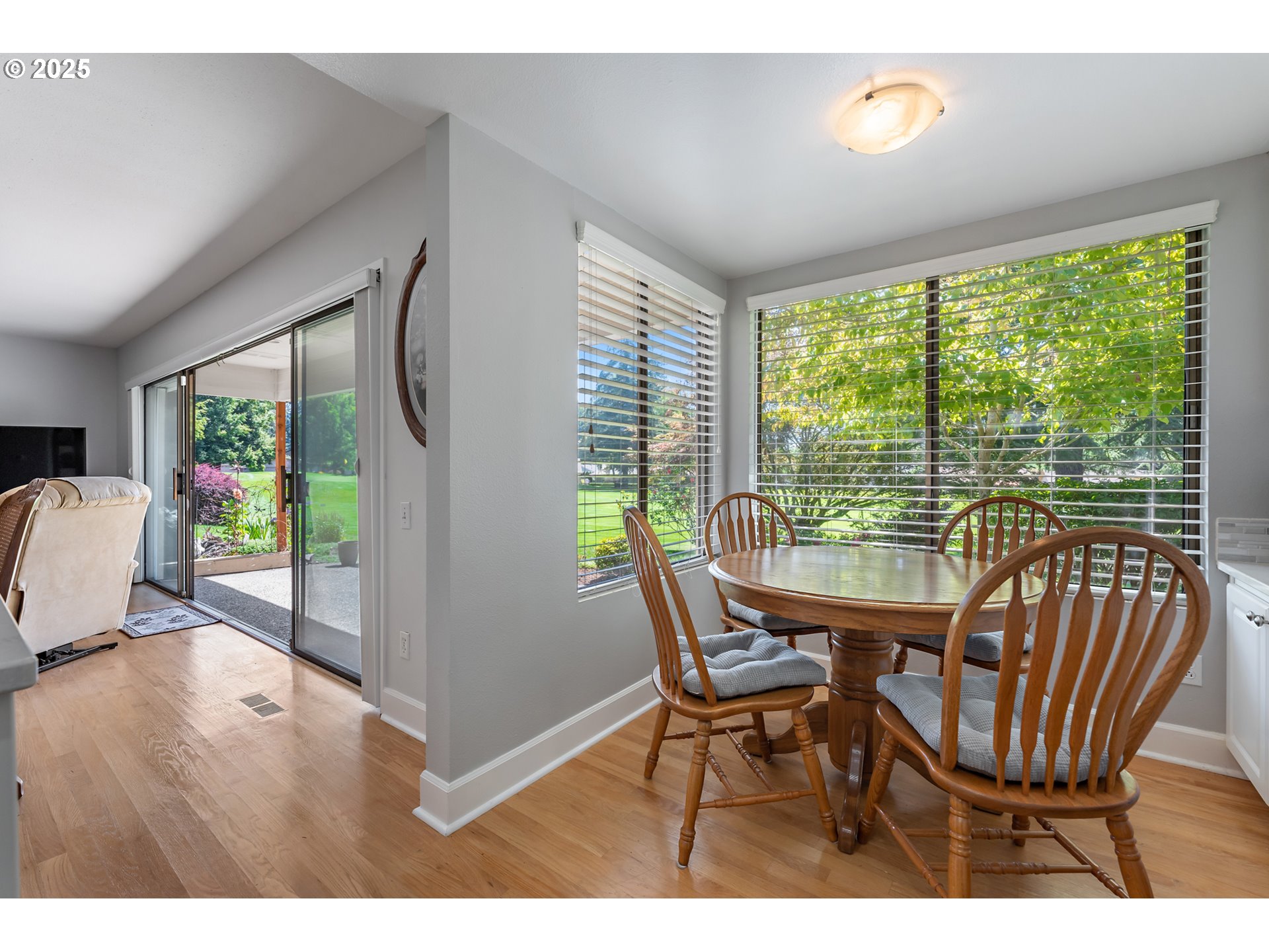 15730 Southwest Greens Way Portland, OR 97224 - Photo 19 of 42 a view of a dining room with furniture window and outside view