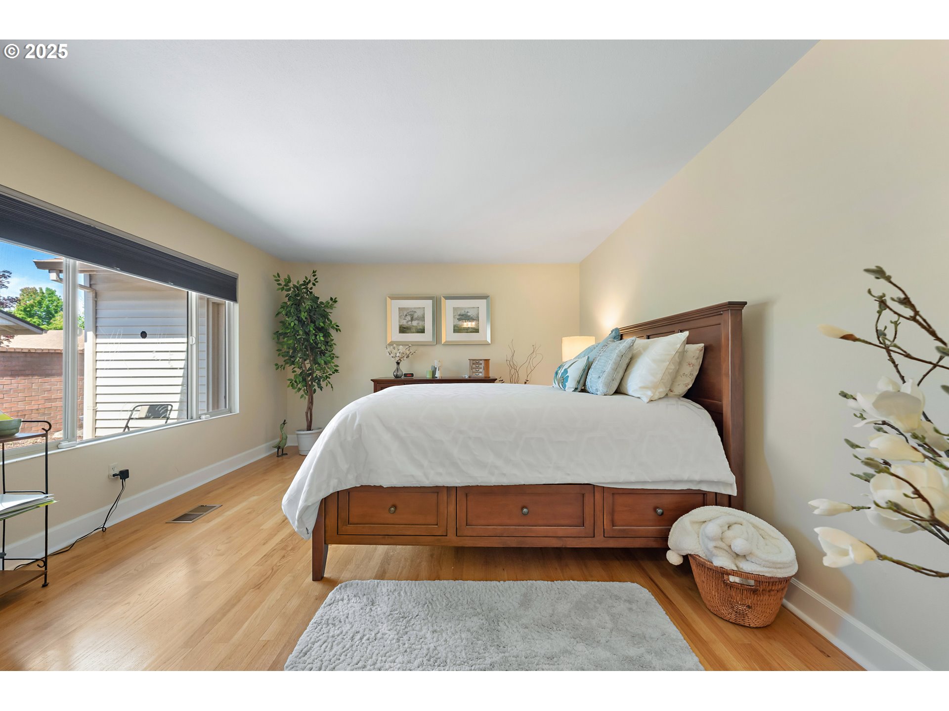 15730 Southwest Greens Way Portland, OR 97224 - Photo 22 of 42 a bedroom with a bed and a window