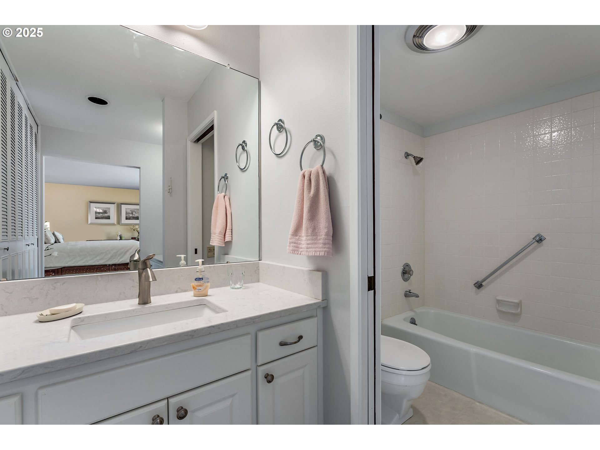 15730 Southwest Greens Way Portland, OR 97224 - Photo 27 of 42 a bathroom with a sink a toilet and a tub