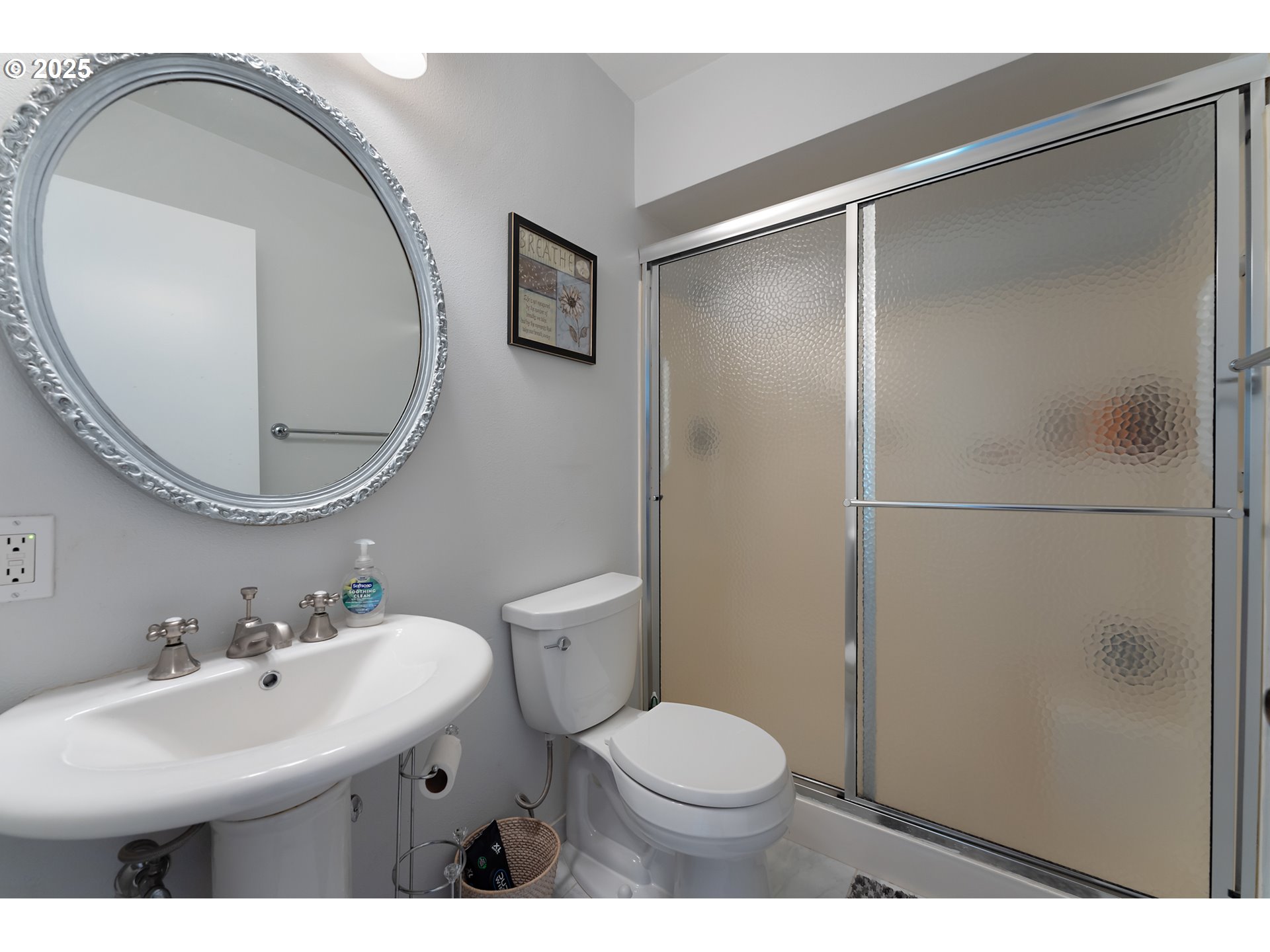 15730 Southwest Greens Way Portland, OR 97224 - Photo 30 of 42 a bathroom with a sink toilet and a mirror