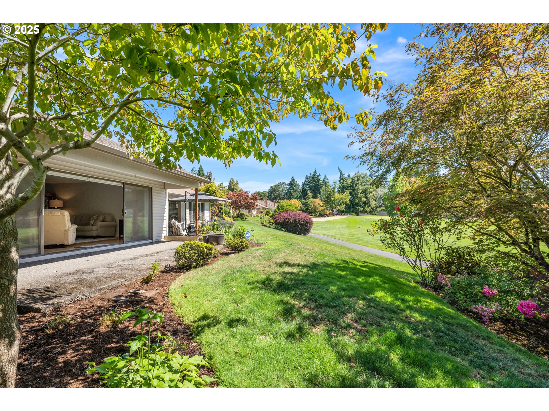 15730 Southwest Greens Way Portland, OR 97224 - Photo 32 of 42 a front view of a house with garden