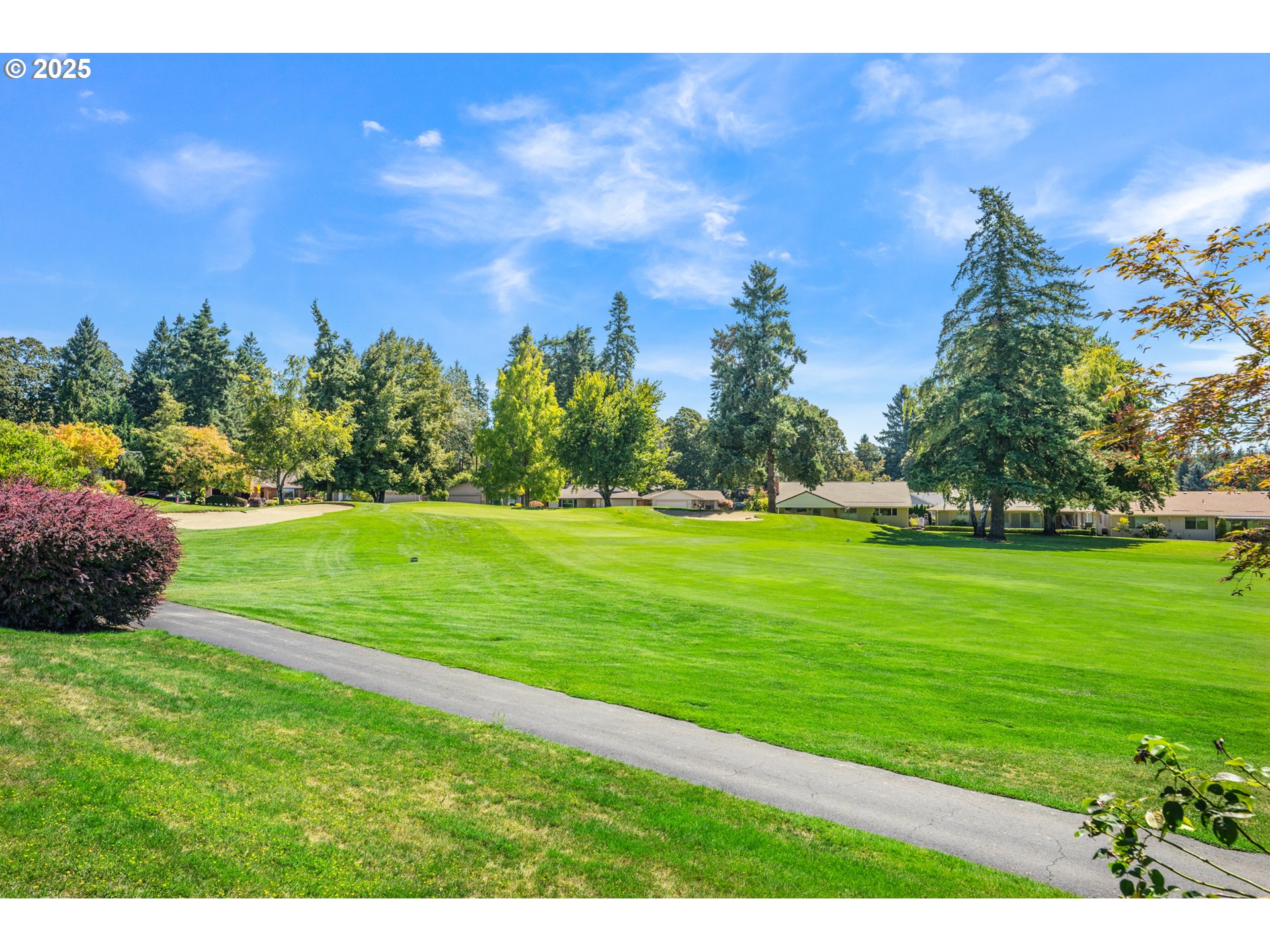 15730 Southwest Greens Way Portland, OR 97224 - Photo 33 of 42 a view of a golf course with a garden