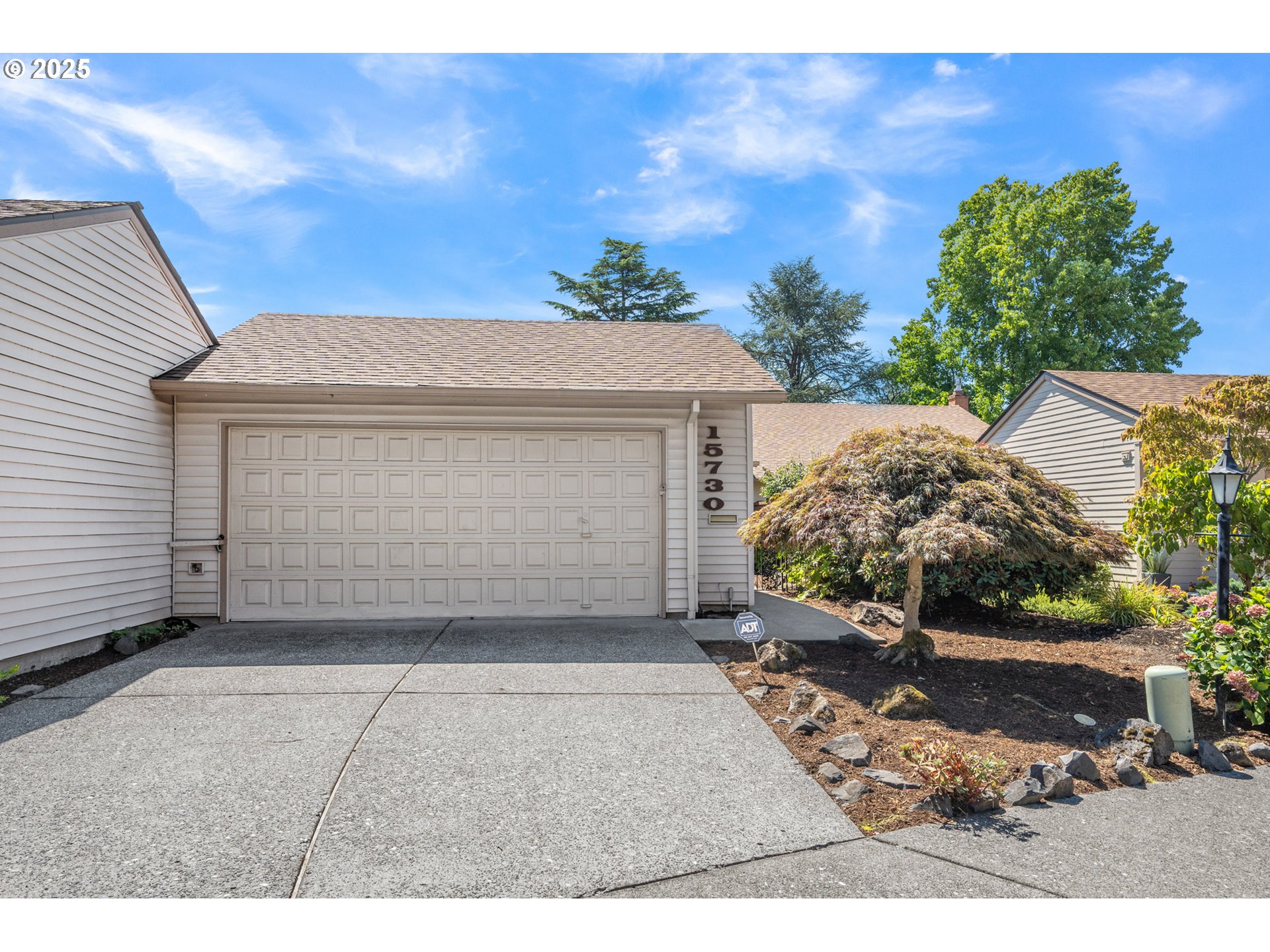 15730 Southwest Greens Way Portland, OR 97224 - Photo 41 of 42 a view of a house with a yard