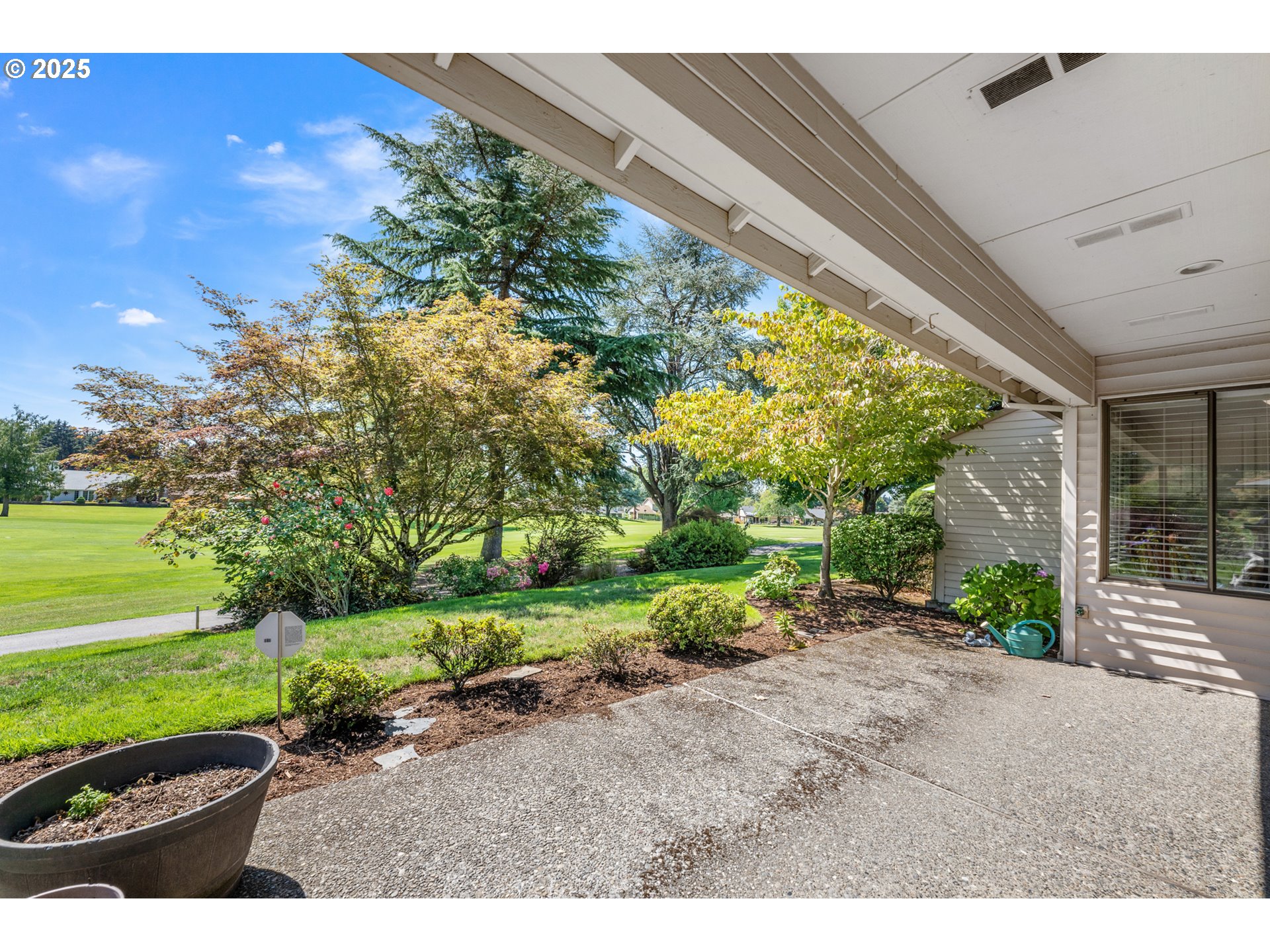 15730 Southwest Greens Way Portland, OR 97224 - Photo 7 of 42 a view of a garden with an outdoor space
