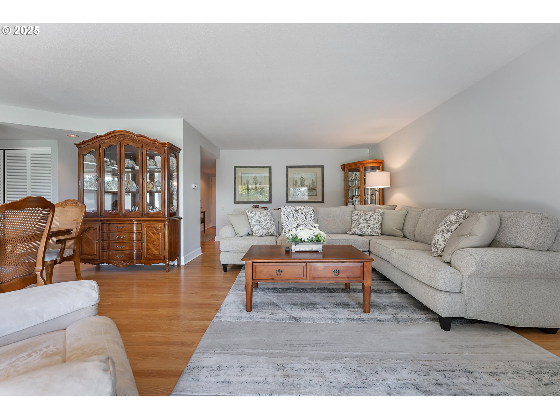 15730 Southwest Greens Way Portland, OR 97224 - Photo 10 of 42 a living room with furniture and a wooden floor