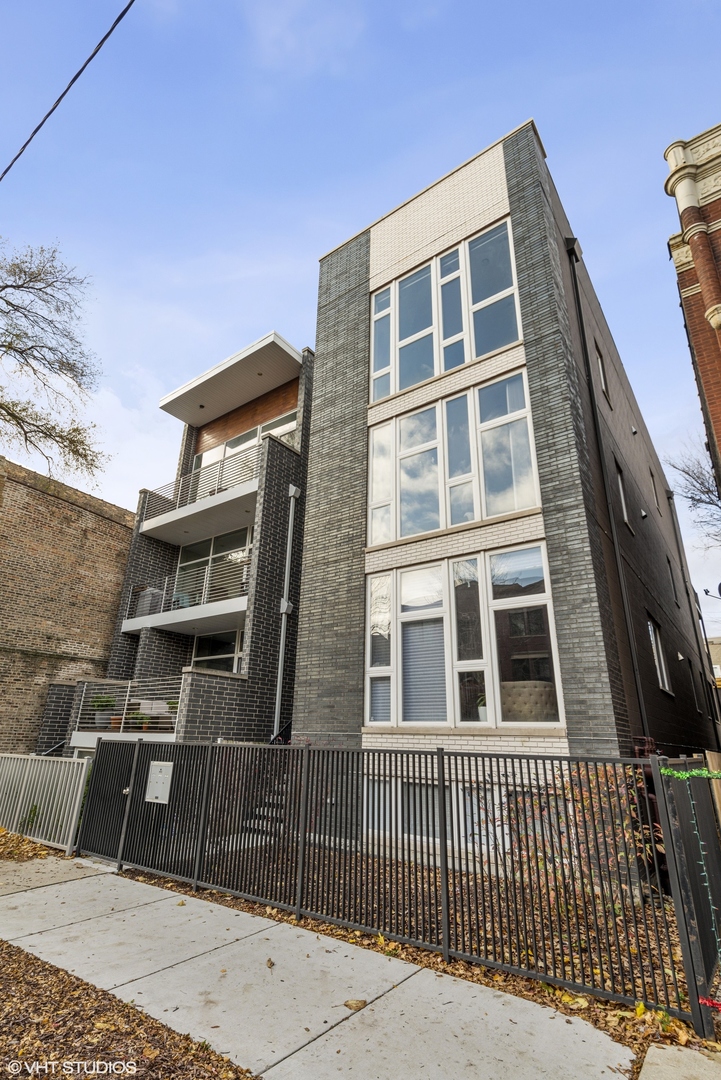 1532 North Artesian Avenue, Unit 3 Chicago, IL 60622 - Photo 1 of 25 a front view of a building