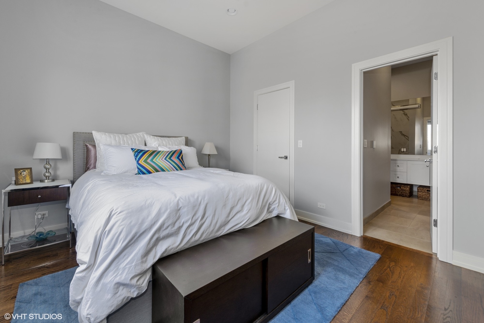 1532 North Artesian Avenue, Unit 3 Chicago, IL 60622 - Photo 11 of 25 a bedroom with a bed and wooden floor