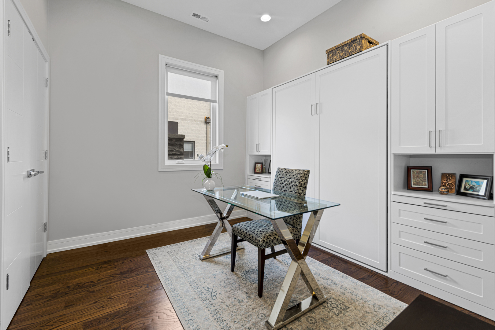 1532 North Artesian Avenue, Unit 3 Chicago, IL 60622 - Photo 13 of 25 a workspace with furniture and wooden floor