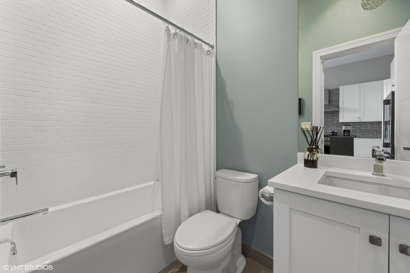 1532 North Artesian Avenue, Unit 3 Chicago, IL 60622 - Photo 14 of 25 a bathroom with a sink toilet vanity and shower