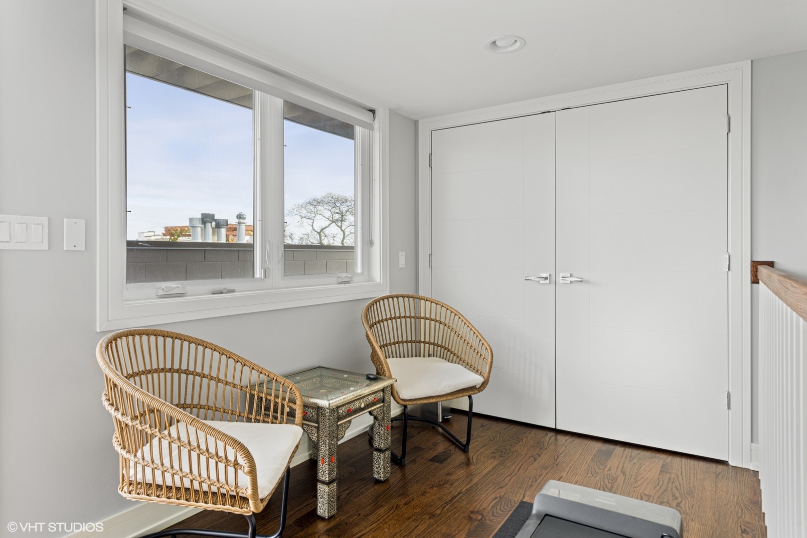 1532 North Artesian Avenue, Unit 3 Chicago, IL 60622 - Photo 18 of 25 a view of a balcony with chair and wooden floor