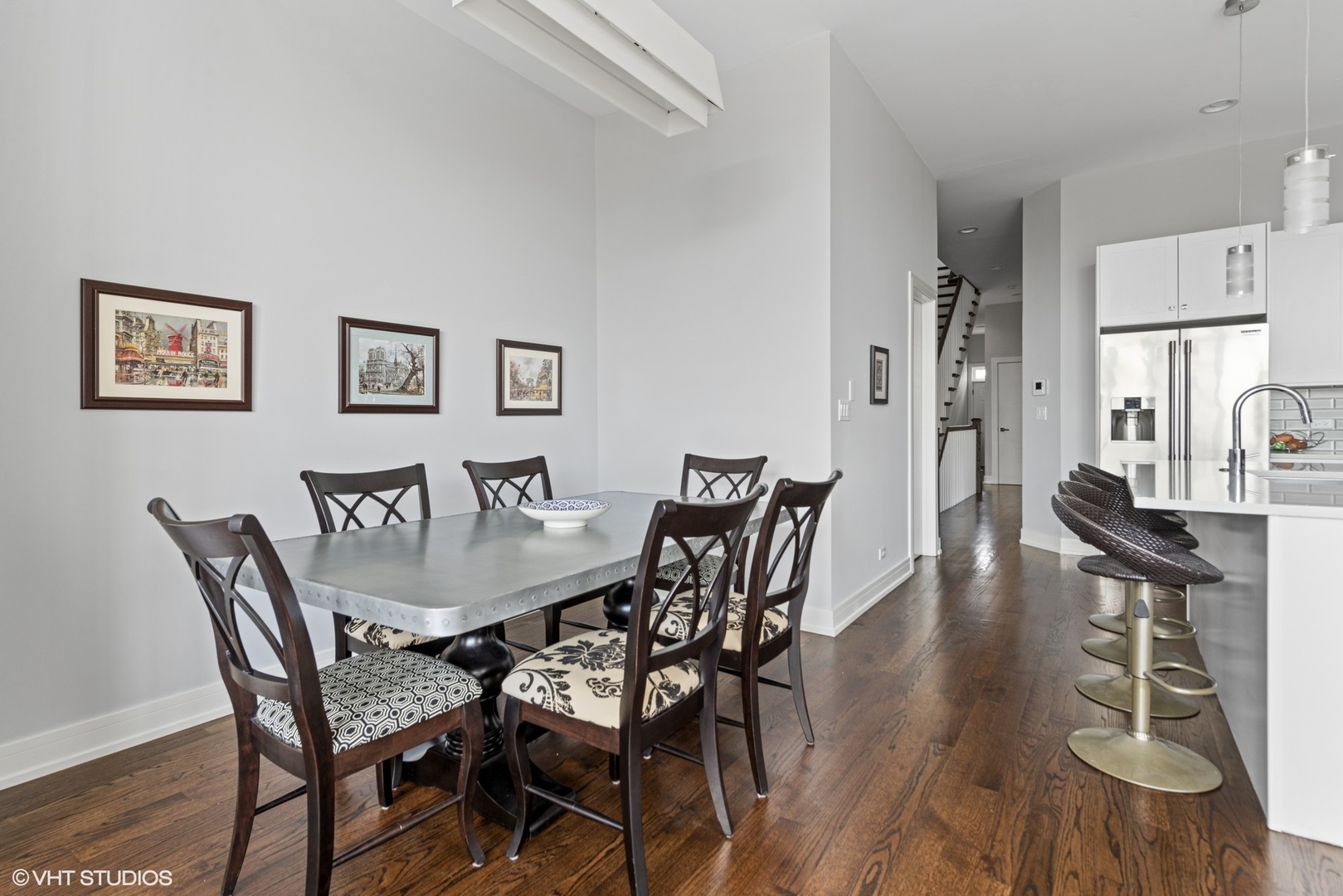 1532 North Artesian Avenue, Unit 3 Chicago, IL 60622 - Photo 9 of 25 a view of a dining room with furniture and wooden floor