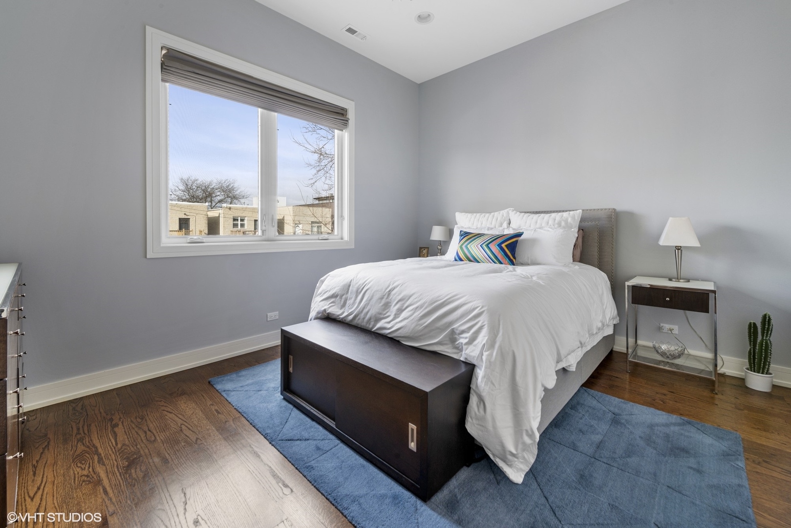 1532 North Artesian Avenue, Unit 3 Chicago, IL 60622 - Photo 10 of 25 a bedroom with a bed and a window