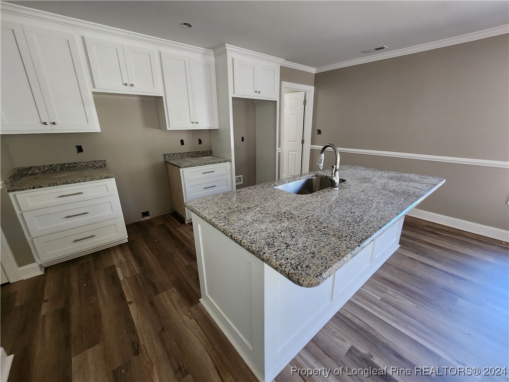 910 West Street Smithfield, NC 27577 - Photo 21 of 47 a kitchen with stainless steel appliances granite countertop a sink stove and refrigerator