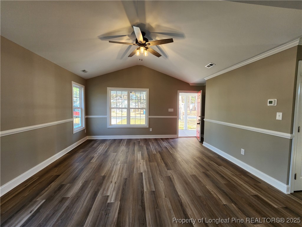 910 West Street Smithfield, NC 27577 - Photo 10 of 47 wooden floor in an empty room with a window