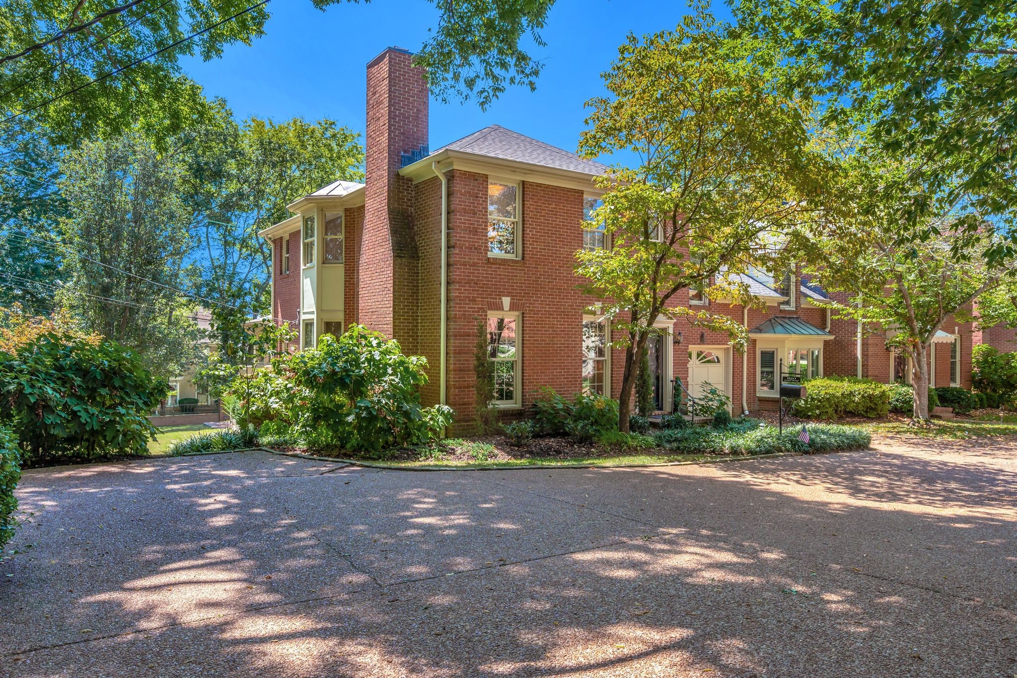 620 Estes Road Nashville, TN 37215 - Photo 1 of 40 a front view of a house with garden