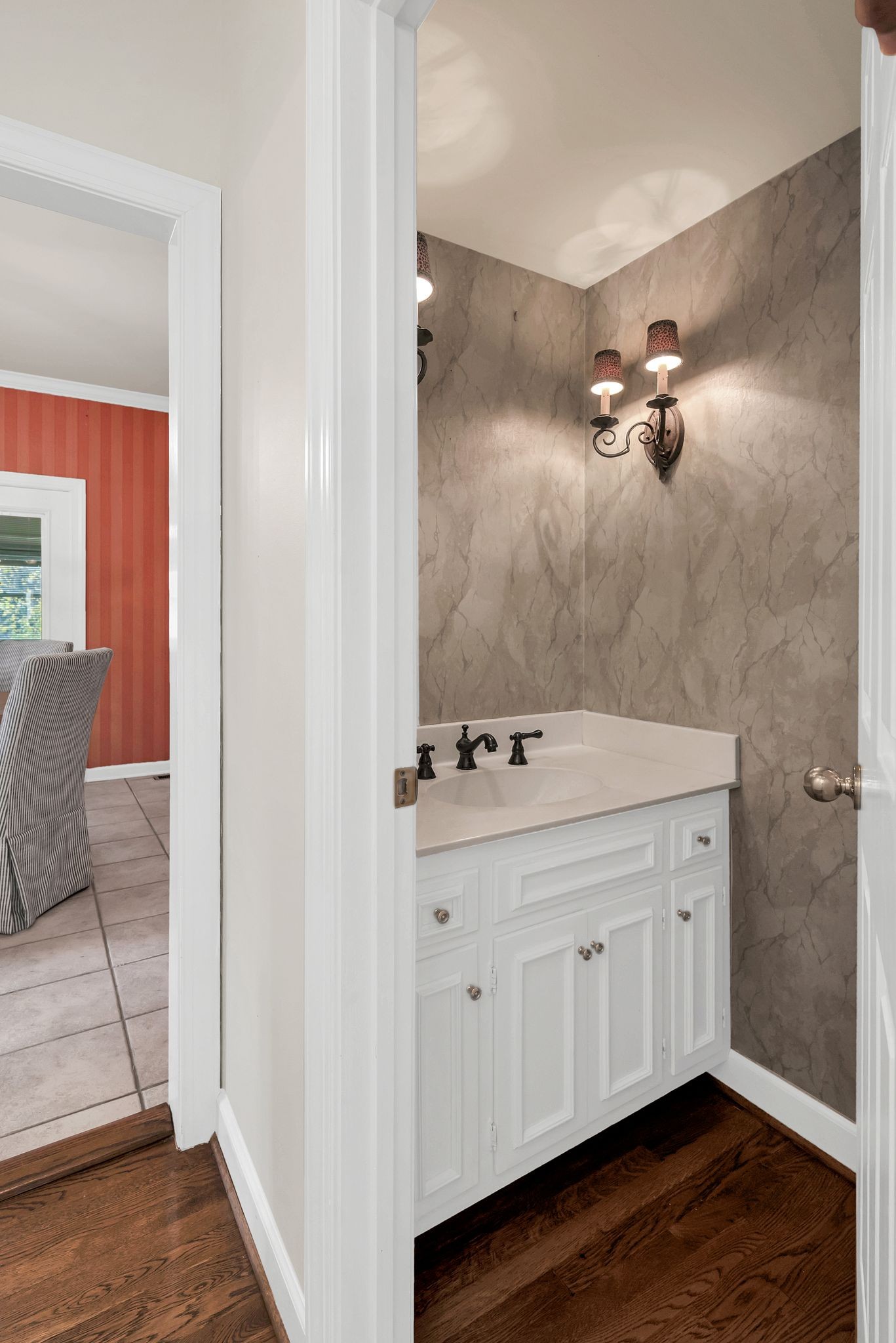 620 Estes Road Nashville, TN 37215 - Photo 19 of 40 a bathroom with a double vanity sink a mirror and a shower