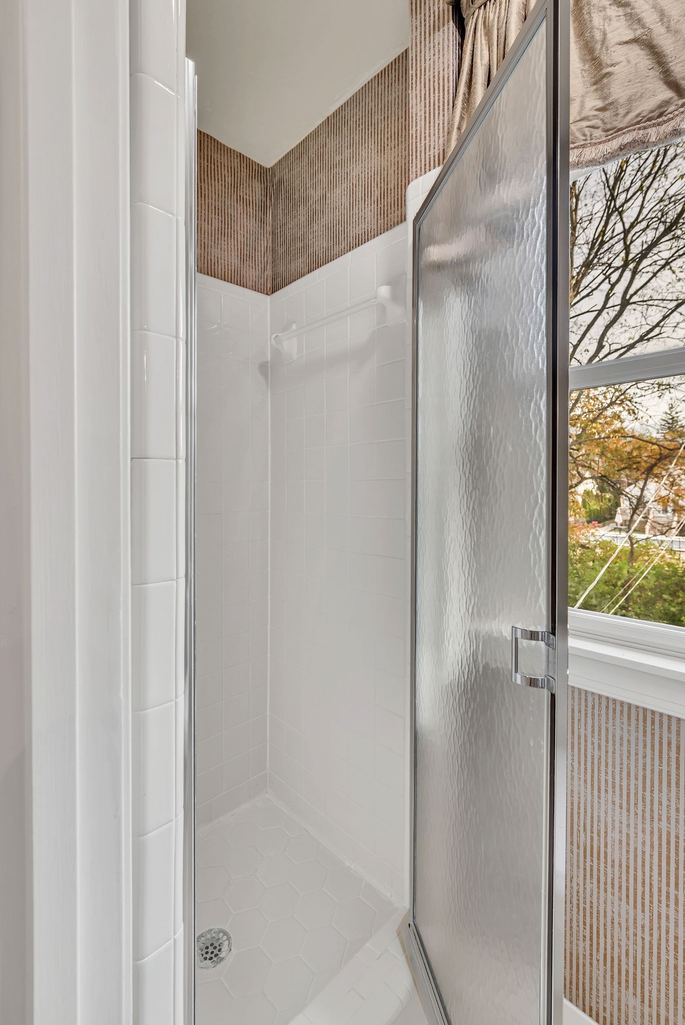 620 Estes Road Nashville, TN 37215 - Photo 29 of 40 a bathroom with a glass shower door