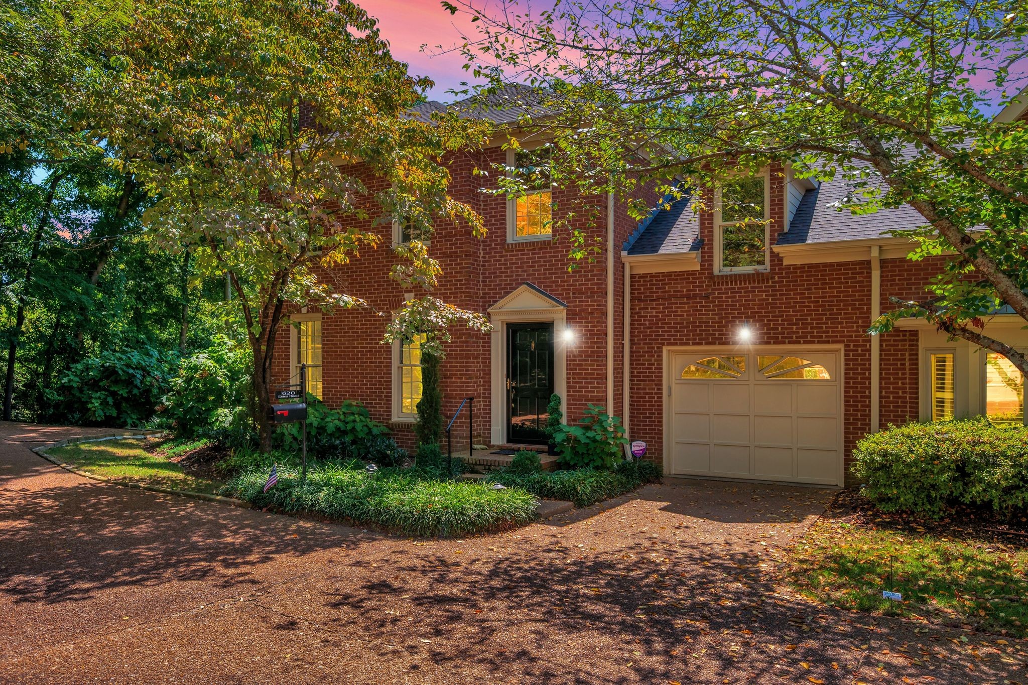 620 Estes Road Nashville, TN 37215 - Photo 40 of 40 a front view of a house with a yard and garage